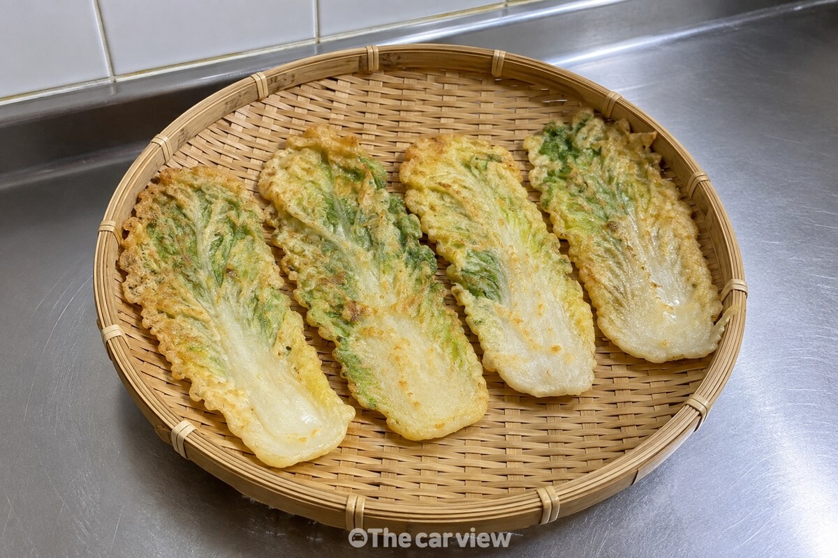 다 부친 배추전을 겹치지 않게 채반에 한 장씩 펼쳐 식히는 모습. / 기사 이해를 돕기 위한 생성형 이미지