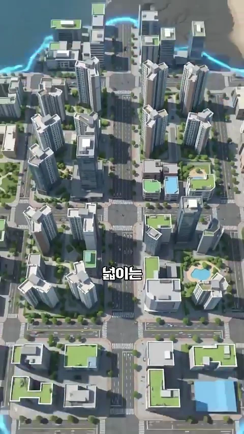 바다와 맞닿아 있는 송도국제도시의 고층 아파트 단지와 도로를 위에서 내려다본 3D 그래픽 영상