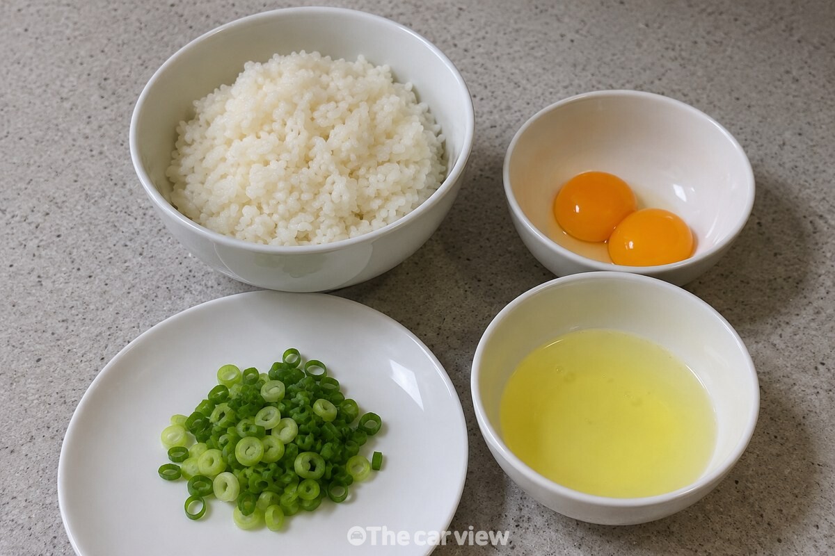 찬밥과 달걀을 흰자와 노른자로 나누어 준비한 조리 재료. / 기사 이해를 돕기 위한 생성형 이미지