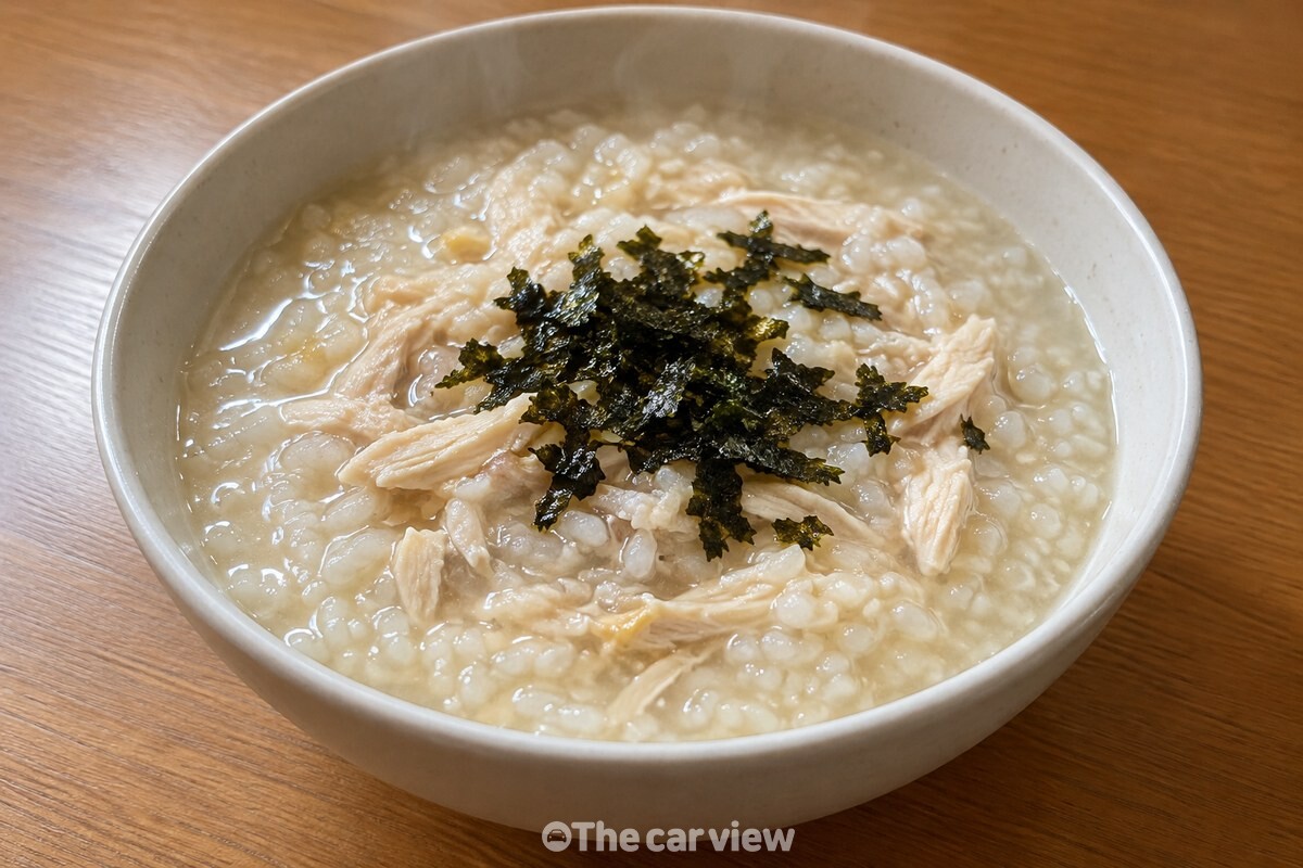 김가루를 올린 완성 닭죽 한 그릇 / 기사 이해를 돕기 위한 생성형 이미지